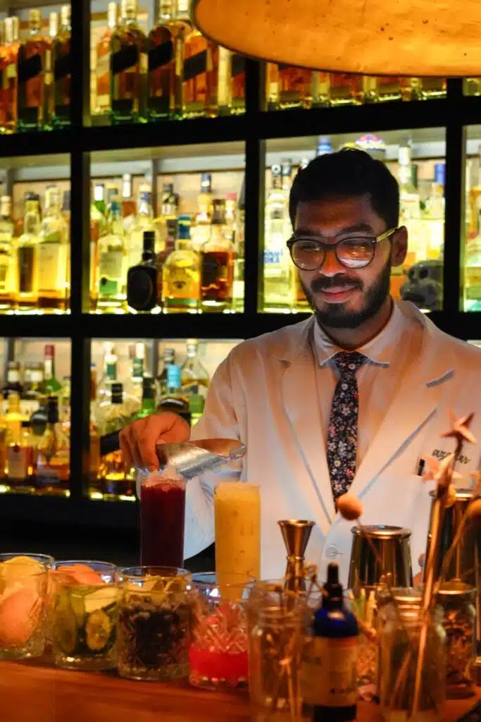 Mixologist making cocktails at Azahar restaurant in Panama City