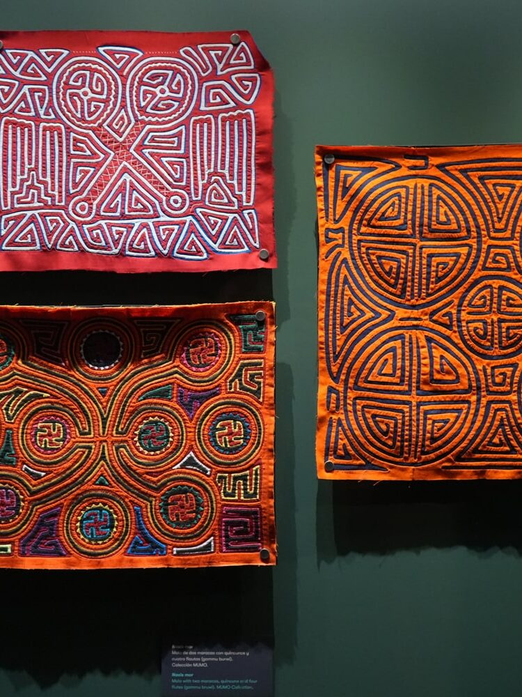 Three mola designs on display at Mola Museum in Casco Viejo Panama