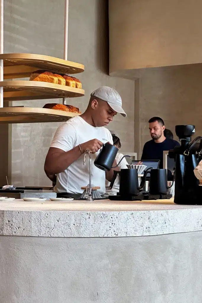 Man making specialty coffee at a trendy cafe in Costa del Este Panama