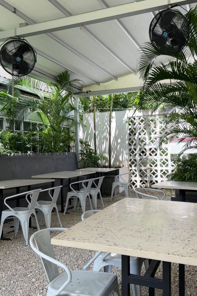 garden seating at a brunch cafe in panama city